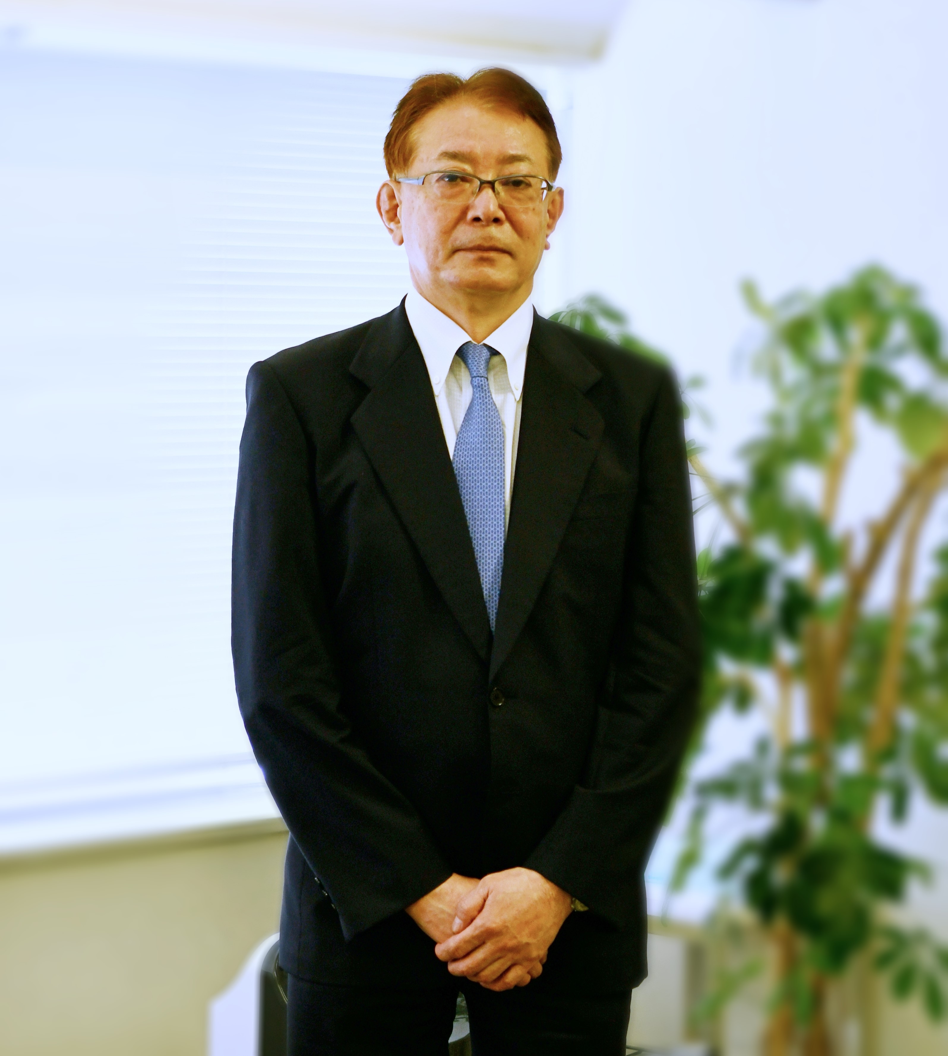 沖村社長社外HP掲載写真.JPG
